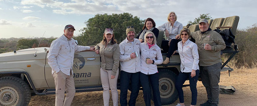 A group of travelling women on safari with their guides