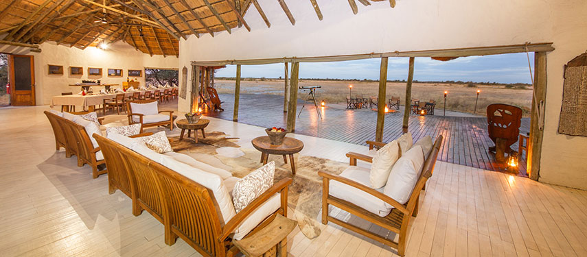 See endless views of the pans from the lounge at Kwando Nxai Pan Camp in Botswana