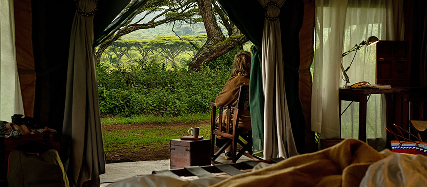Canvas tents surrounded by lush greenery at Lemala Ngorongo Camp