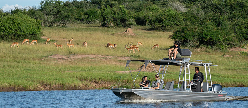 Tourists boating on Lake Rwanyakazinga, Akagera National Park, Rwanda