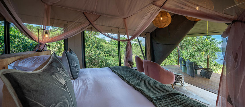 Divine bed swathed in flynets at Magashi Camp, Rwanda