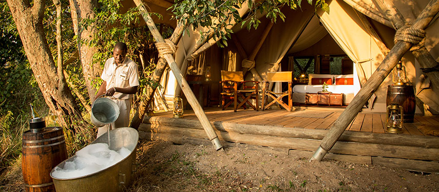 Elegant under canvas tented accommodation with a private outdoor bath at Mara Expedition Camp