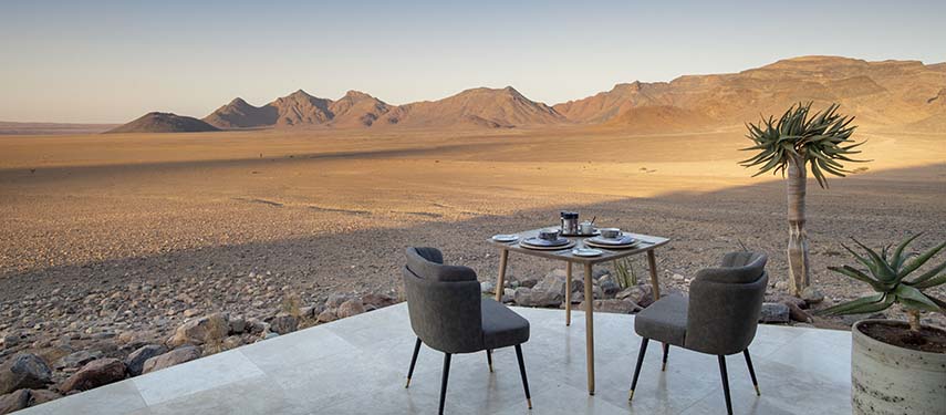 Enjoy expansive views of the Namib desert over tea at andBeyond's Sossusvlei Desert Lodge in Namibia