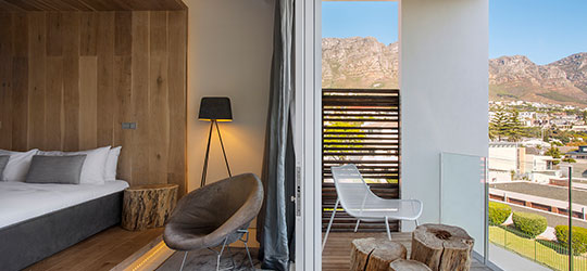 Bedrooms at POD Boutique Hotel offer incredible mountain and ocean views