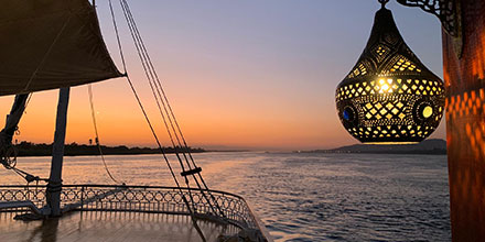 Sunset over the Nile River aboard a traditional dahabeya in Egypt
