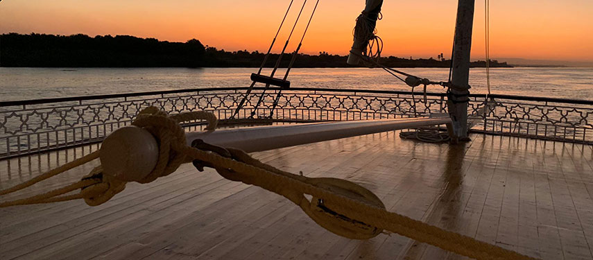 Sunset over the Nile River aboard a traditional dahabeya in Egypt