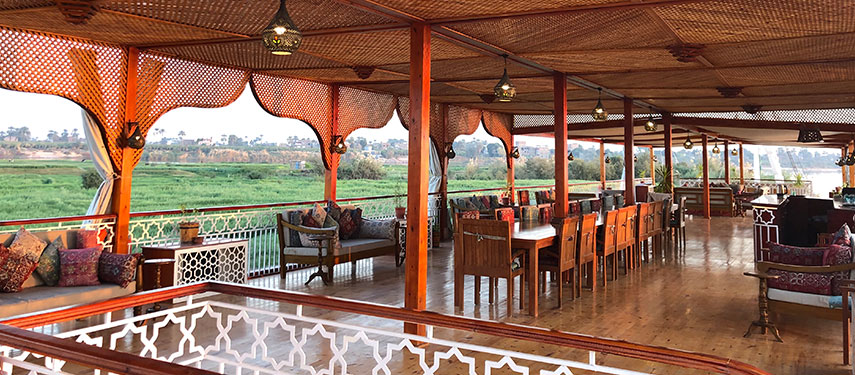 The dining deck of Queeny Of The Nile luxury dahabeya boat