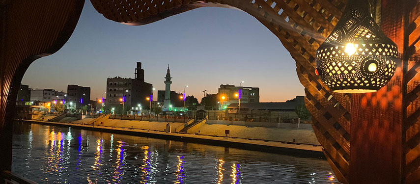 A view across the Nile of Cairo at sunset