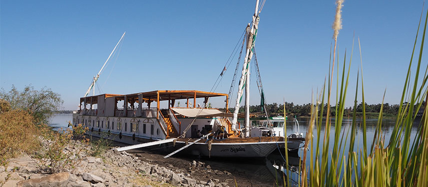 Queeny Of The Nile docked on the banks of the Nile River in Egypt.