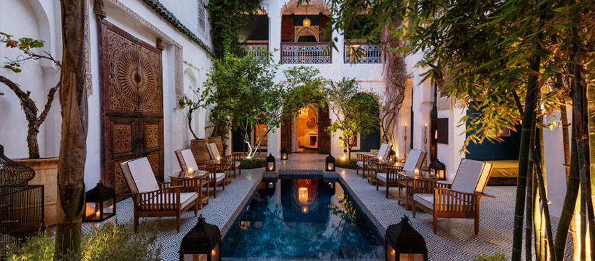 Relax by the pool at the boutique Riad Les Yeux Bleus