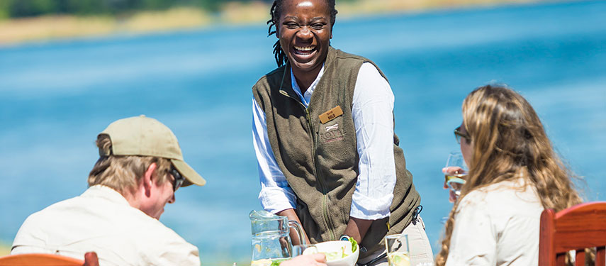 Service with a smile overlooking the Zambezi at Royal Zambezi Lodge