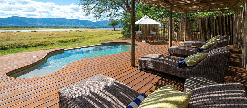 Swimming pool overlooking the Zambezi River at Ruckomechi safari camp, Mana Pools National Park, Zimbabwe
