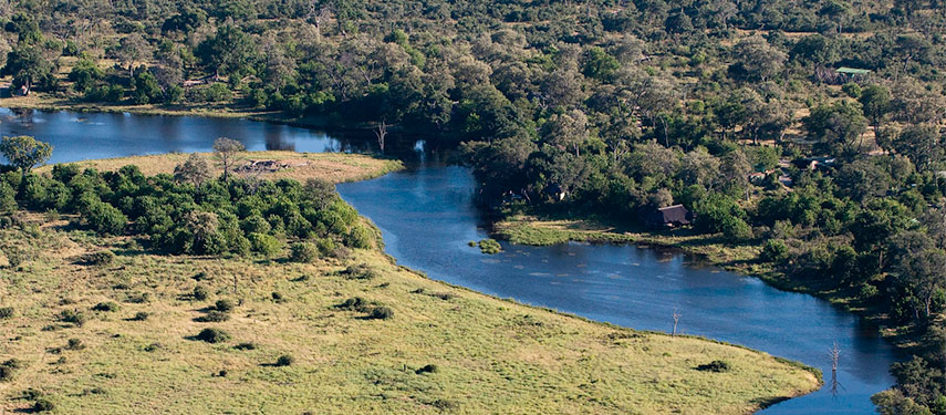 The Savute Channel winds through the Botswana landscape, viewed from a helicopter