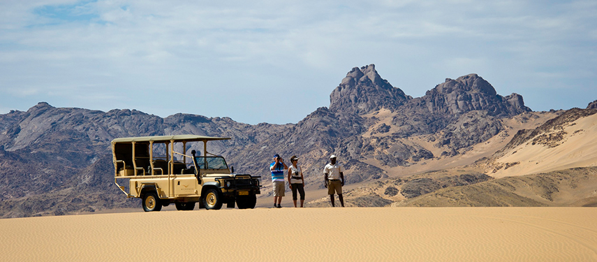 Game drive in the dunes of Kaokoveld, Namibia