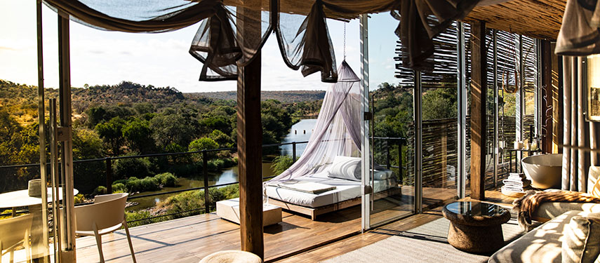 Read a book on the balcony or search for wildlife in the waters below at Singita Lebombo