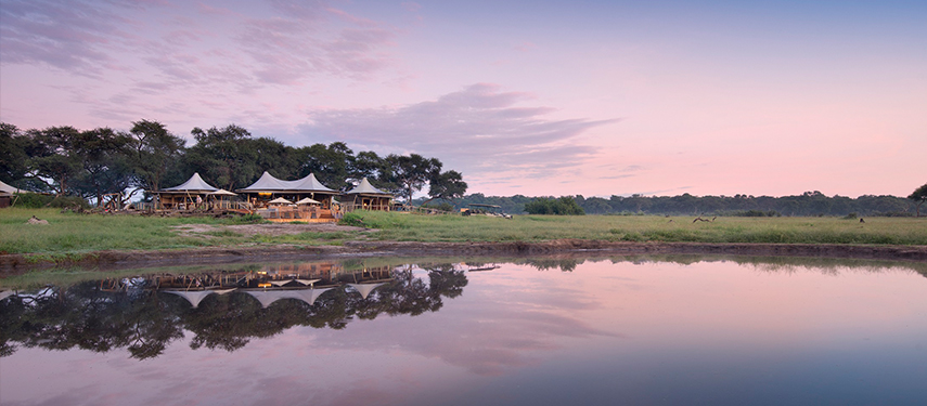 At Somalisa enjoy watching spectacular sunsets over the lake in front of camp