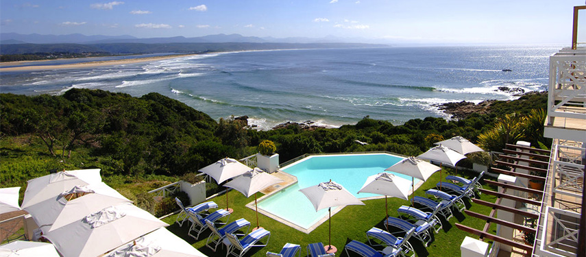 Relax by the pool overlooking the ocean at The Plettenberg