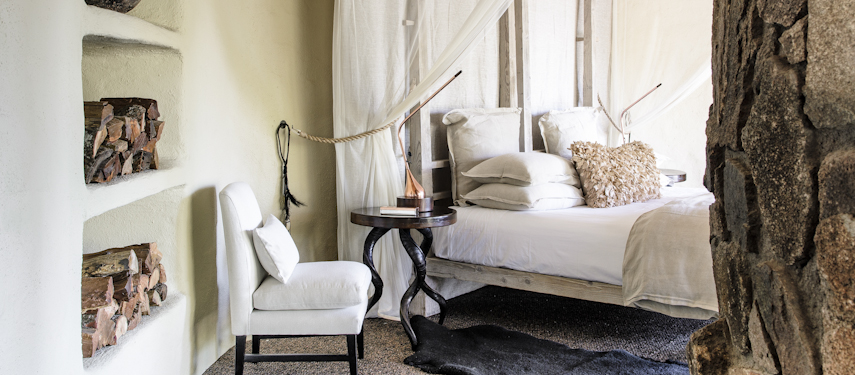 Simple yet elegantly designed bedrooms can be found at Singita Boulders in South Africa