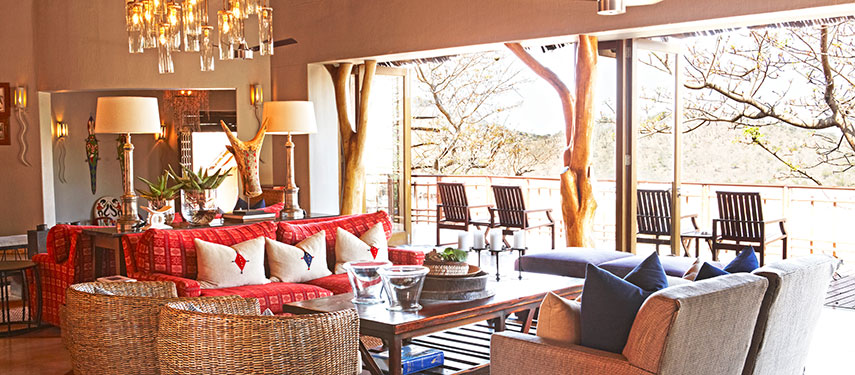 Admire the African savannah from the comfort of the sitting rom at Thanda Safari Lodge